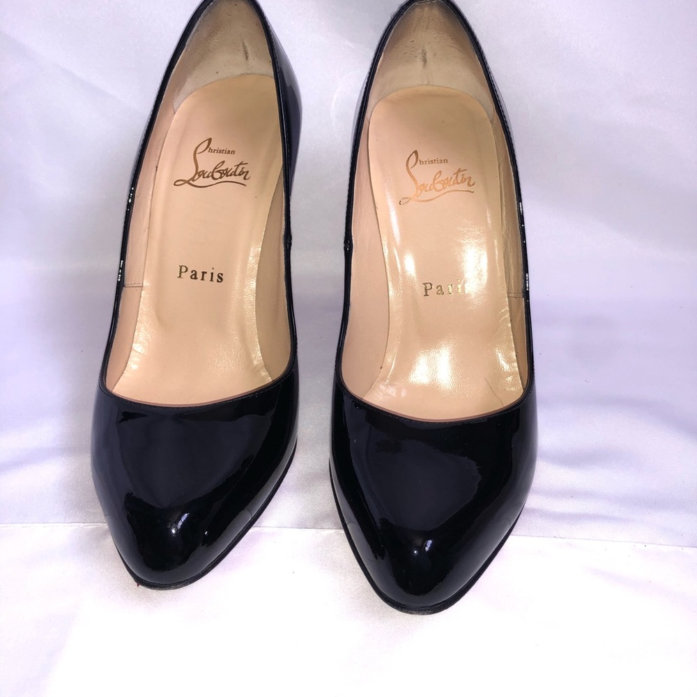Christian Louboutin red bottom heals